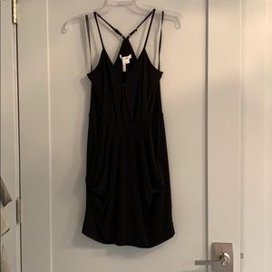 Black mini dress with pockets.